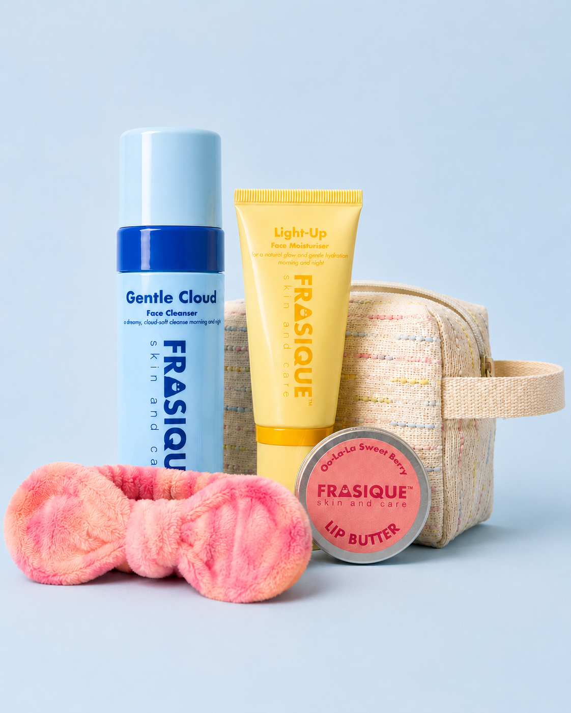 Frasique skincare product bundles for tweens and teens including a face cleanser, face moisturiser and lip balm on a light blue background