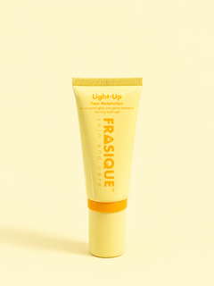 Frasique Light-Up Face Moisturiser for tweens and teens tube on a yellow background